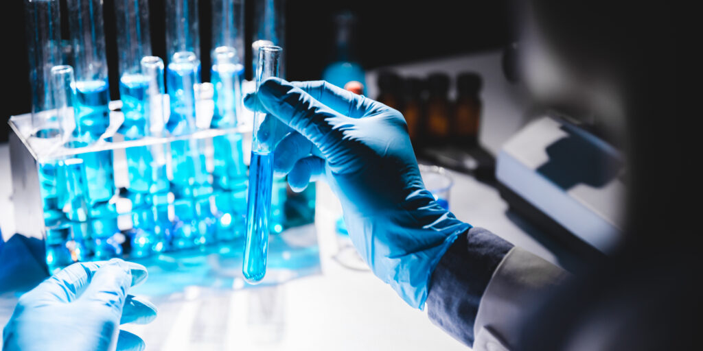 Health care researchers working in medical science technology research laboratory